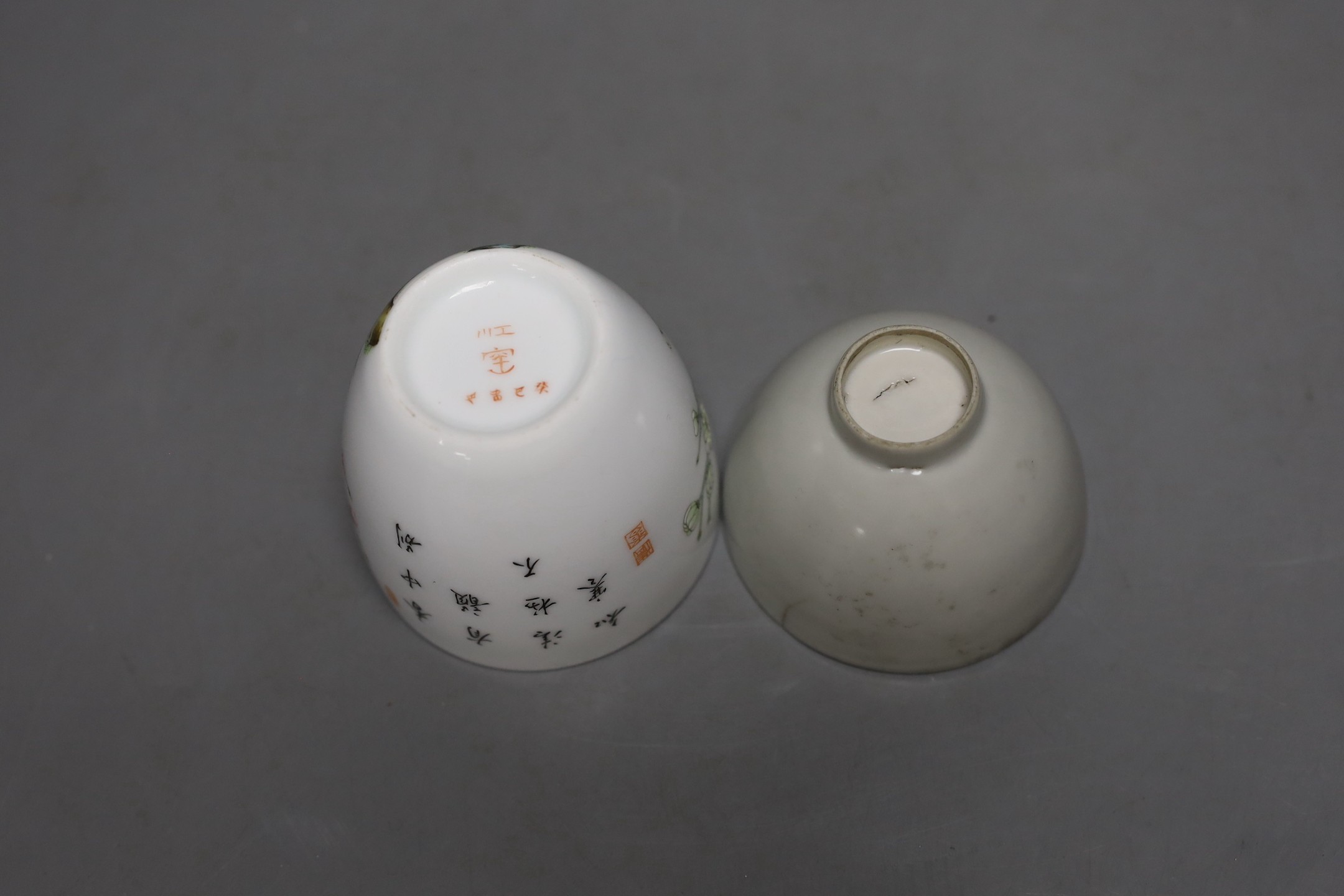 A Chinese internally moulded porcelain cup and a famille rose cup, 7cms high